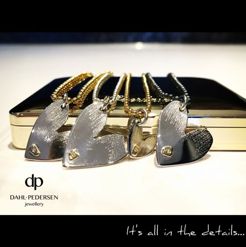 Small silver heart, gold logo